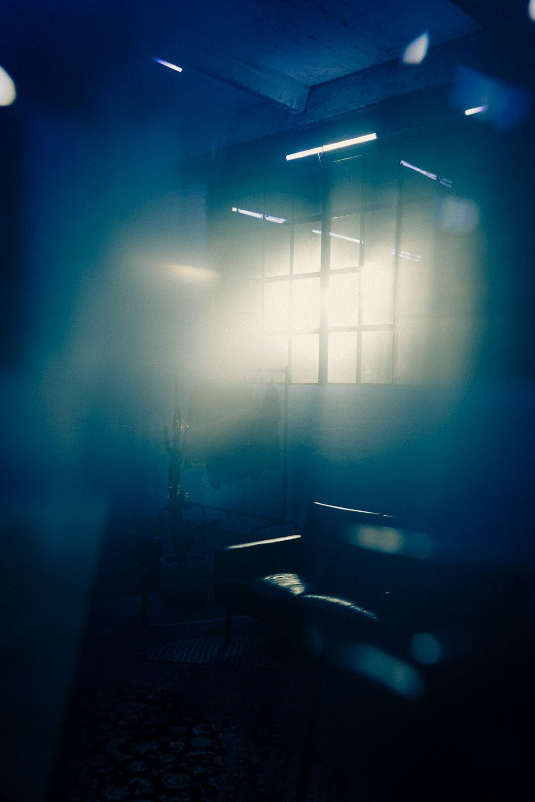 shadowy figure in dark room