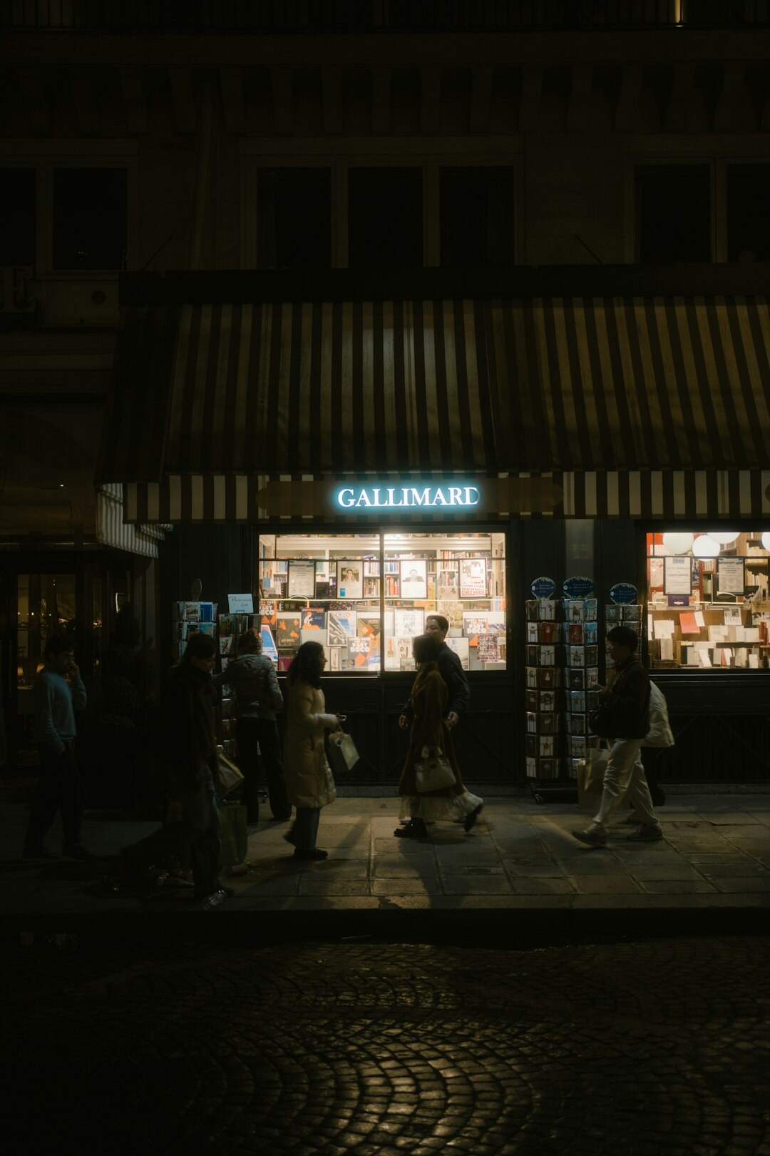 person reading book at night